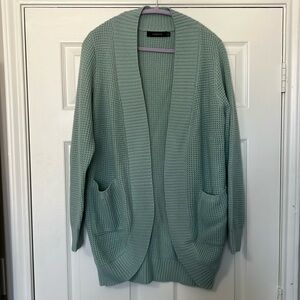 Cardigan. Light blue. XL